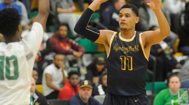 Springfield’s Leonard Taylor (with ball). Springfield defeated host Northmont 71-49 in a boys high school basketball game on Friday, Dec. 22, 2017. MARC PENDLETON / STAFF