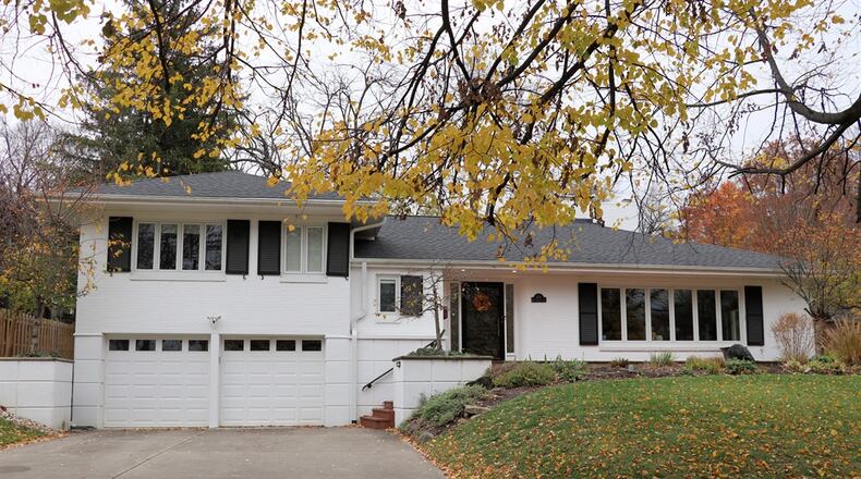 Nestled within an Oakwood tree-lined boulevard, the brick tri-level at 400 E. Schantz Drive has 2,782 square feet of living space. It is listed for $540,000 by Sibcy Cline Realtors. CONTRIBUTED