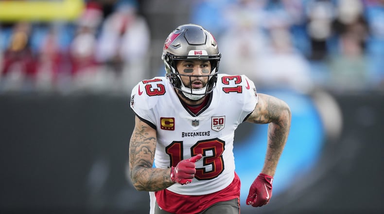 FILE - Tampa Bay Buccaneers wide receiver Mike Evans runs during an NFL football game between the Carolina Panthers and the Tampa Bay Buccaneers on Dec. 21, 2025, in Charlotte, N.C. (AP Photo/Jacob Kupferman, file)
