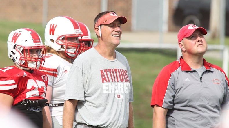Wittenberg’s Joe Fincham and Dan Smith watch a punting drill during practice on Wednesday, Sept. 12, 2018, at Edwards-Maurer Field in Springfield. David Jablonski/Staff