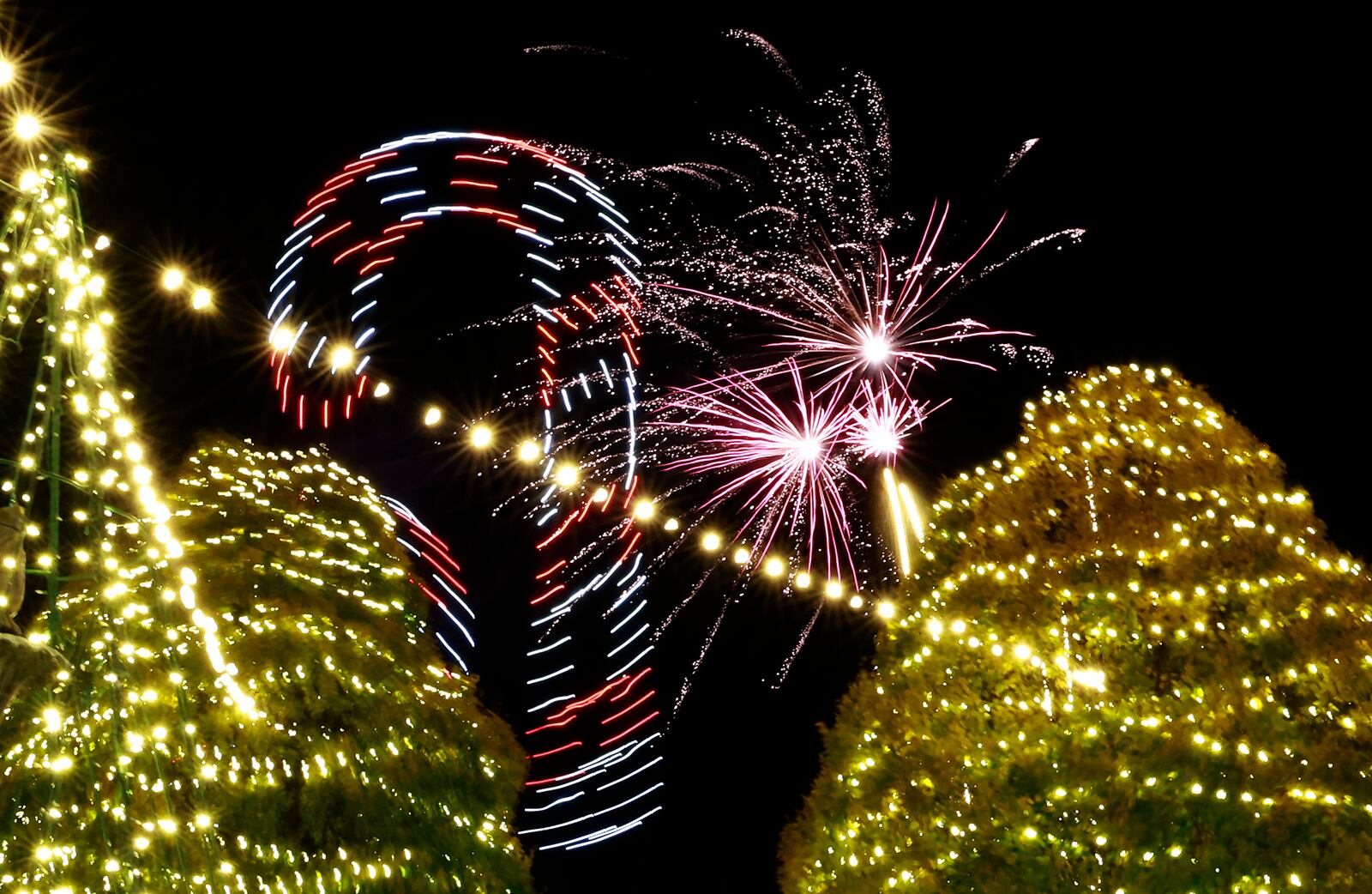 Fireworks returned to Holiday in the City in downtown Springfield Friday, Nov. 29, 2024. This year they were accompanied by a drone display.  BILL LACKEY