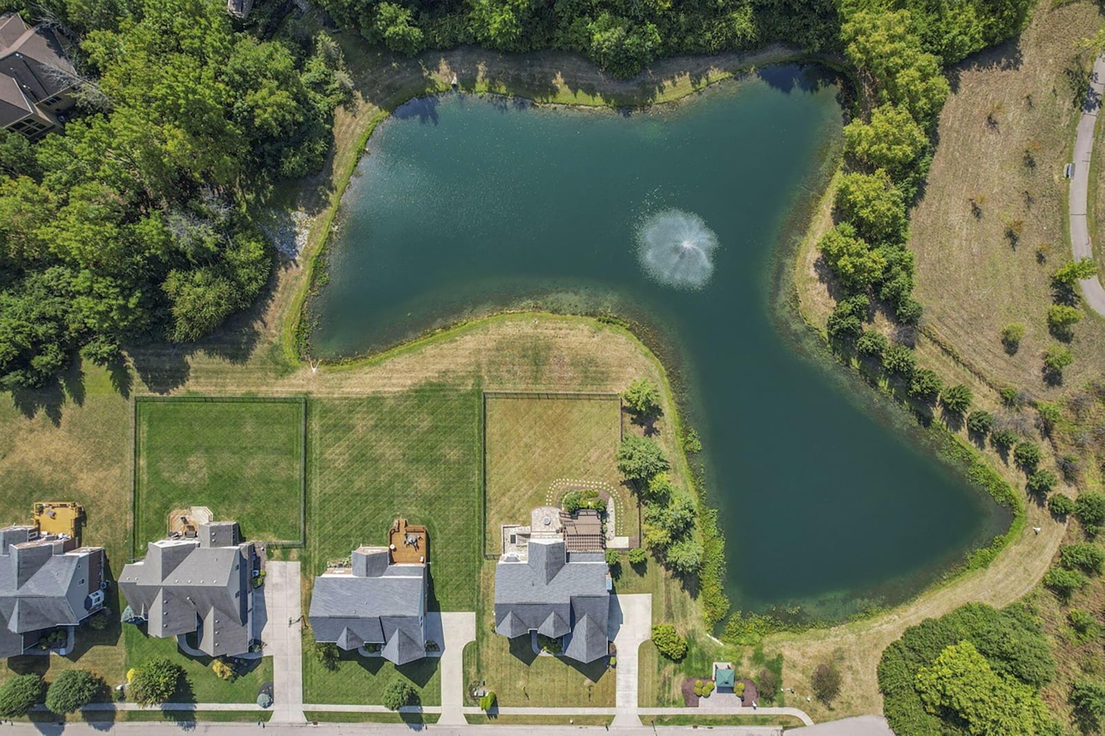 The home sits on a lake with fountain and has views of the water from windows on the back of the home. CONTRIBUTED