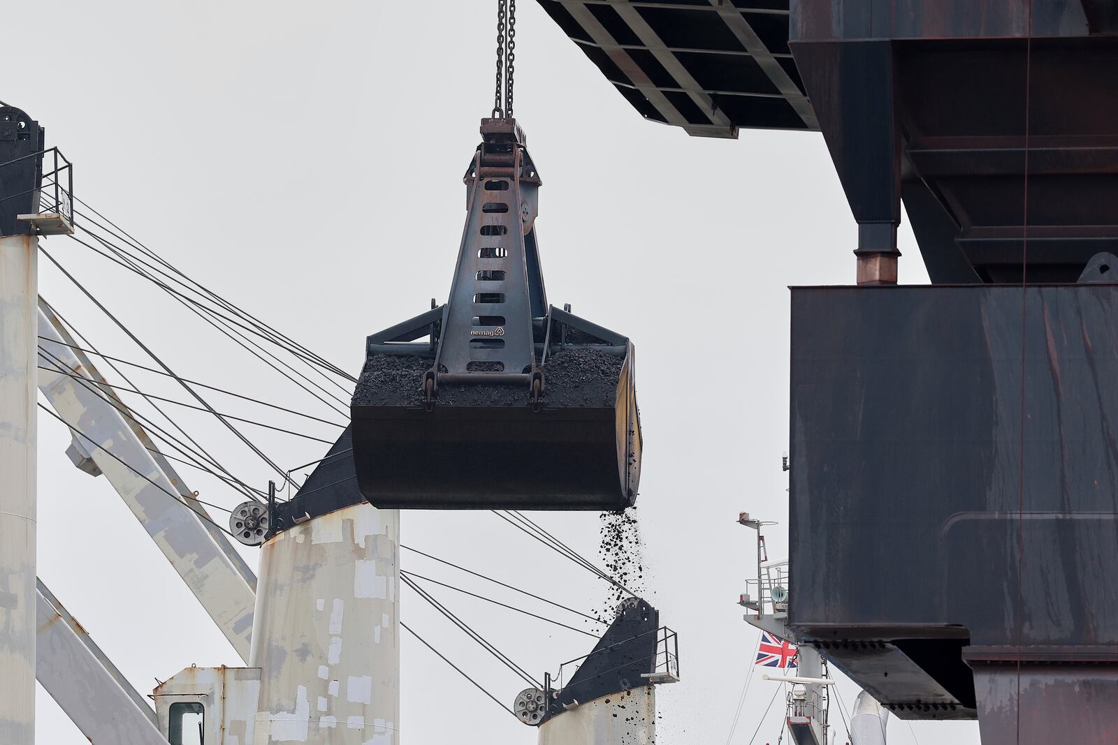 Coking coal is unloaded at Immingham Port, northern England, Tuesday, April 15, 2025. (Darren Staples/Pool Photo via AP)