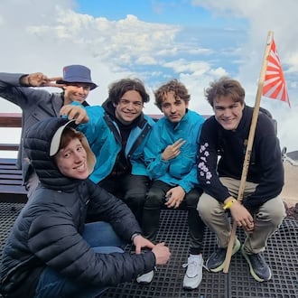 Andrew Locke, far right, joins other college students on an international trip. CONTRIBUTED