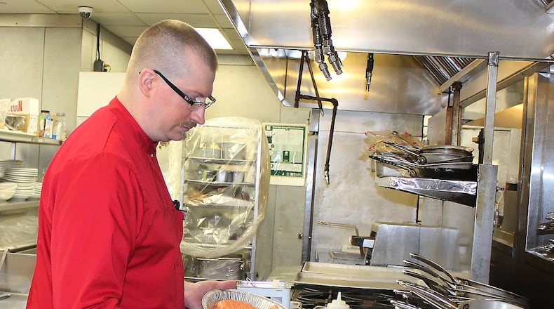 Mela Urban Bistro chef, Garry Sheppeard prepares a fish dinner. JEFF GUERINI/STAFF