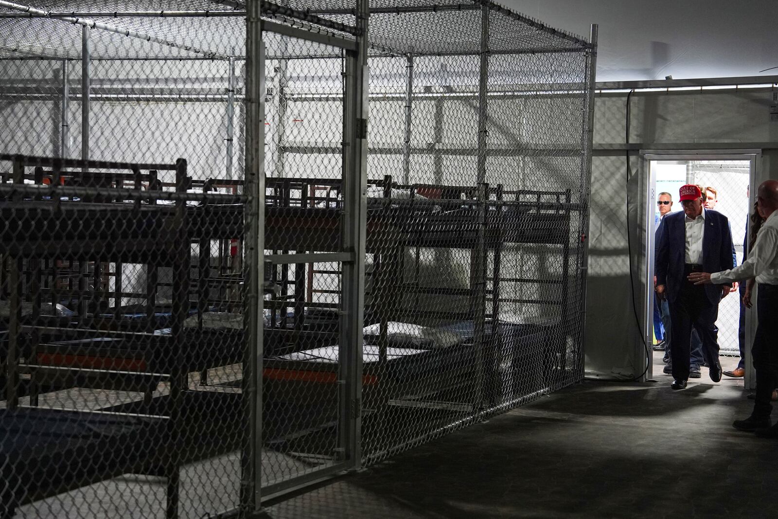 President Donald Trump tours "Alligator Alcatraz," a new migrant detention facility at Dade-Collier Training and Transition facility, Tuesday, July 1, 2025, in Ochopee, Fla. (AP Photo/Evan Vucci)