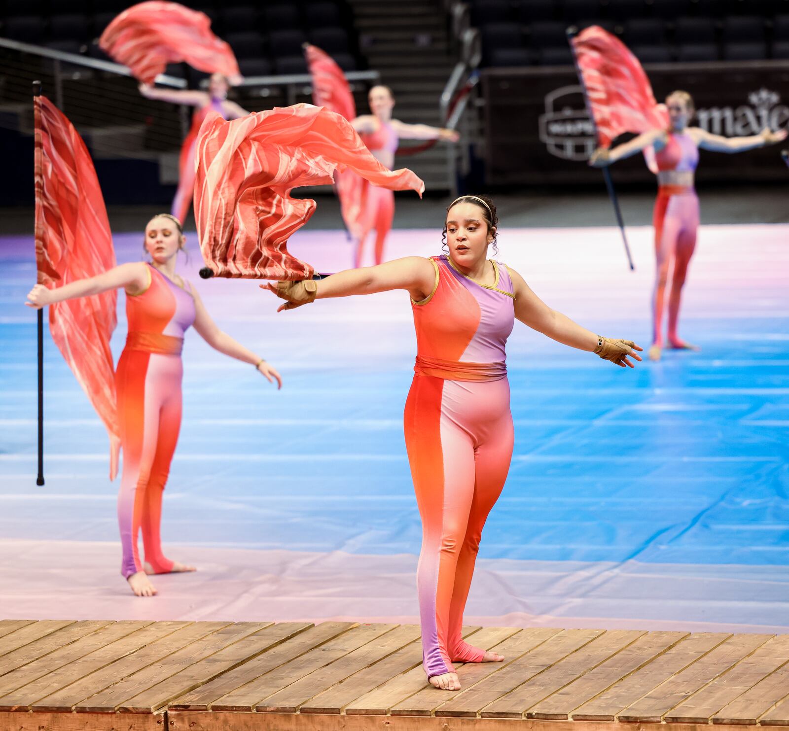 Members of Miamisburg High School's color guard perform during the Winter Guard International's World Championships Scholastic Semifinals on Friday morning at University of Dayton Arena. BRYANT BILLING / STAFF