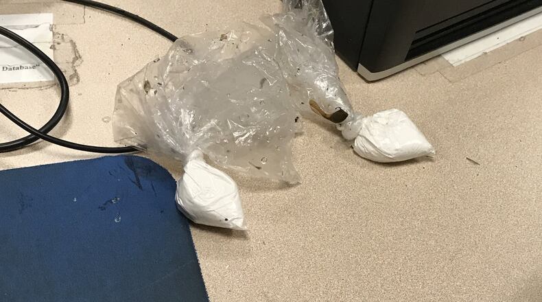 A closer look at the drugs recovered by the Springfield Police Division on Monday, June 5. MICHAEL COOPER/STAFF