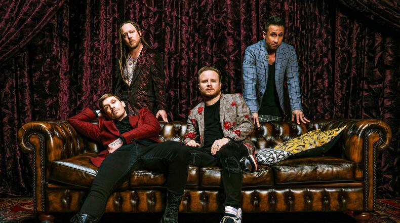 Shinedown, (left to right) Brent Smith, Barry Kerch, Zach Myers and Eric Bass, performs at Fraze Pavilion in Kettering, on Tuesday, Aug. 10. The group made Billboard history in August 2020 by being the first act in its 40-year run to have 16 number one singles on the Mainstream Rock Songs airplay chart.