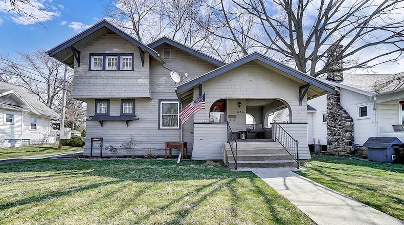 The 3-bedroom Cape Cod-style home features a wrap-around porch with a half wall all around. The home has a freshly waterproofed basement. CONTRIBUTED PHOTO