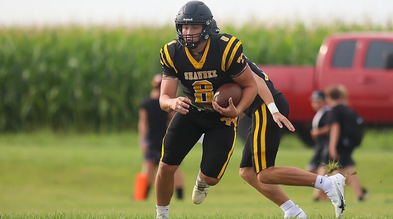Shawnee High School junior running back Max Guyer runs ball the during their scrimmage game against Greenon on Friday, Aug. 14 in Springfield. CONTRIBUTED PHOTO BY MICHAEL COOPER