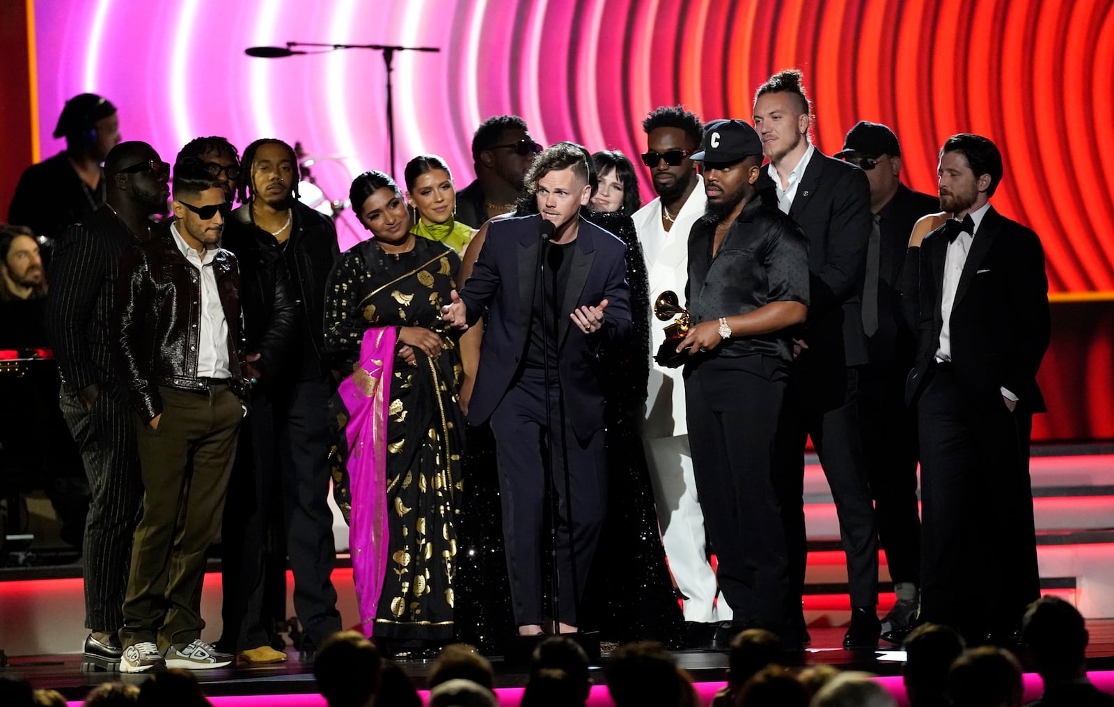 Elevation Worship and Maverick City Music accept the award for best contemporary christian music album for "Old Church Basement" at the 64th Annual Grammy Awards on Sunday, April 3, 2022, in Las Vegas. Elevation Worship performs Aug. 12 at the Nutter Center. (AP Photo/Chris Pizzello)