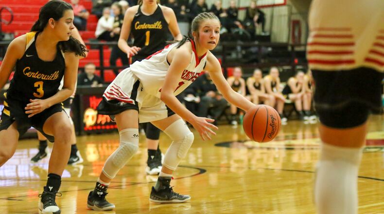 Cutline: Tecumseh High School junior Mae Mastin looks for a teammate during their game against Centerville on Jan. 28, 2019. The Arrows are 5-1 and 3-0 in the Central Buckeye Conference Kenton Trail Division this winter. CONTRIBUTED PHOTOS BY MICHAEL COOPER
