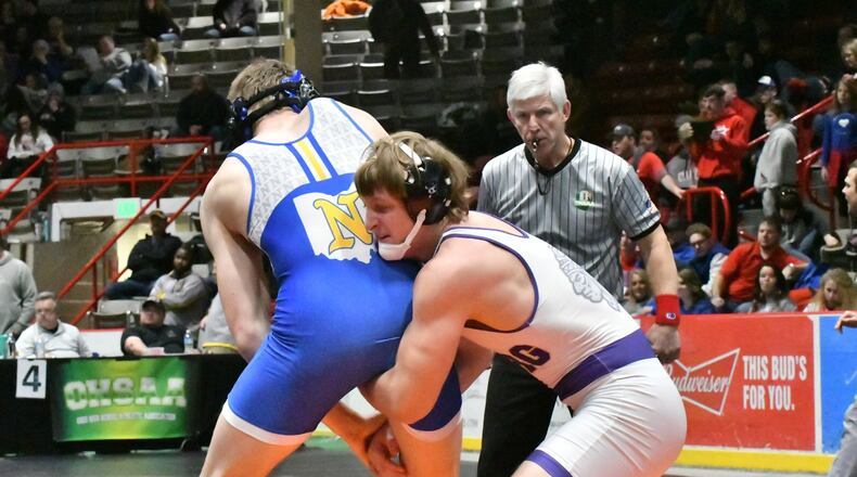 Mechanicsburg senior Jaron Patterson (right) claimed the Division III district title on Saturday, which also advanced him to the state tournament next week in Columbus. Greg Billing / Contributed