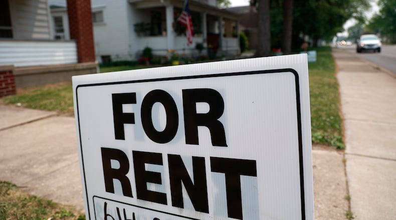A "For Rent" sign in front of a house along North Limestone Street Monday, June 5, 2023. BILL LACKEY/STAFF