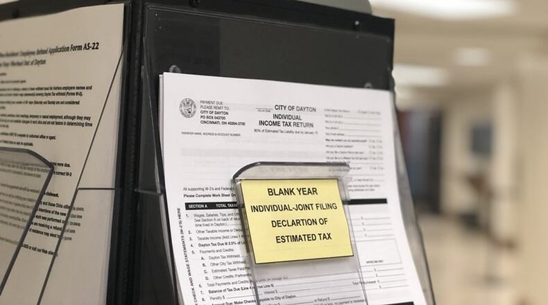 City of Dayton income tax forms at City Hall. Today is Tax Day. CORNELIUS FROLIK / STAFF