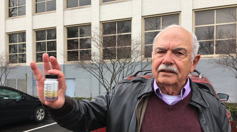 Last April, Larry Hess filled up his diesel truck at a Huber Heights gas station. Less than 70 miles later, his check engine light came on for water in his fuel system. He still has some of what the dealership drained from his tank. PHOTO BY JOHN BEDELL