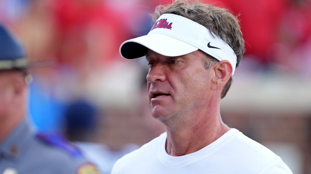 Mississippi head coach Lane Kiffin leave the field following an NCAA college football game against The Citadel, Saturday, Nov. 8, 2025, in Oxford, Miss. (AP Photo/Rogelio V. Solis)