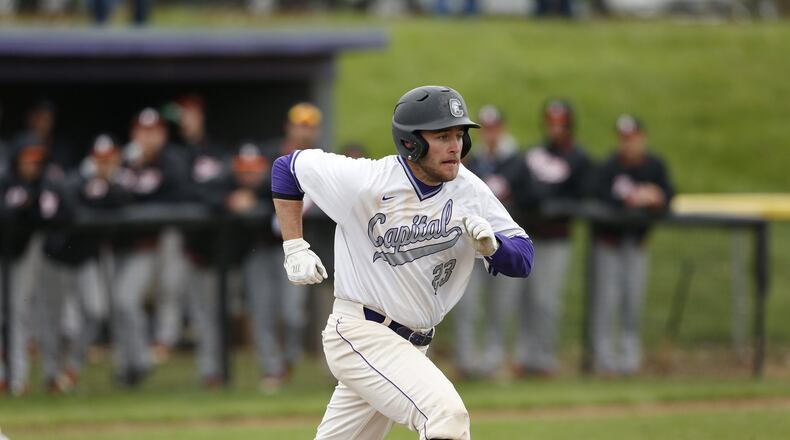 Tyler Gibbons runs to first base while playing for Capital University. Photo by Joe Maiorana
