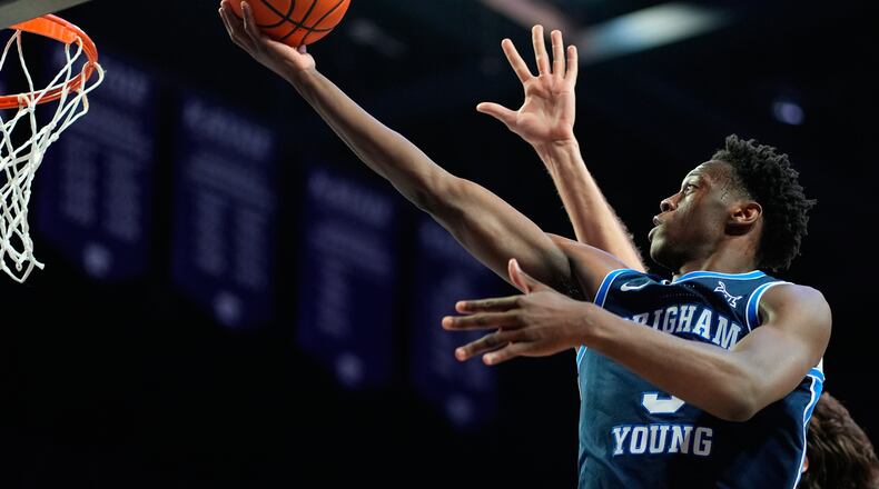 BYU forward AJ Dybantsa shoots during the first half of an NCAA college basketball game against Kansas State, Saturday, Jan. 3, 2026, in Manhattan, Kan. (AP Photo/Charlie Riedel)