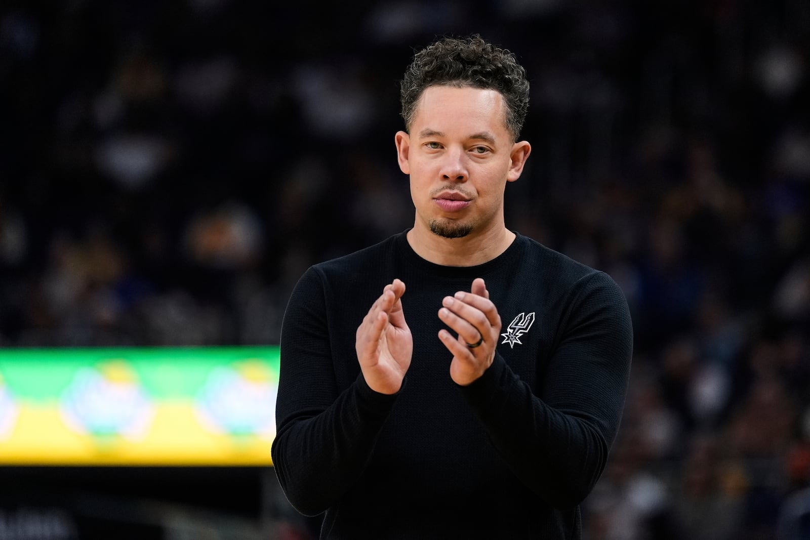 San Antonio Spurs interim head coach Mitch Johnson reacts during the first half of an NBA basketball game against the Golden State Warriors, Wednesday, April 9, 2025, in San Francisco. (AP Photo/Godofredo A. Vásquez)