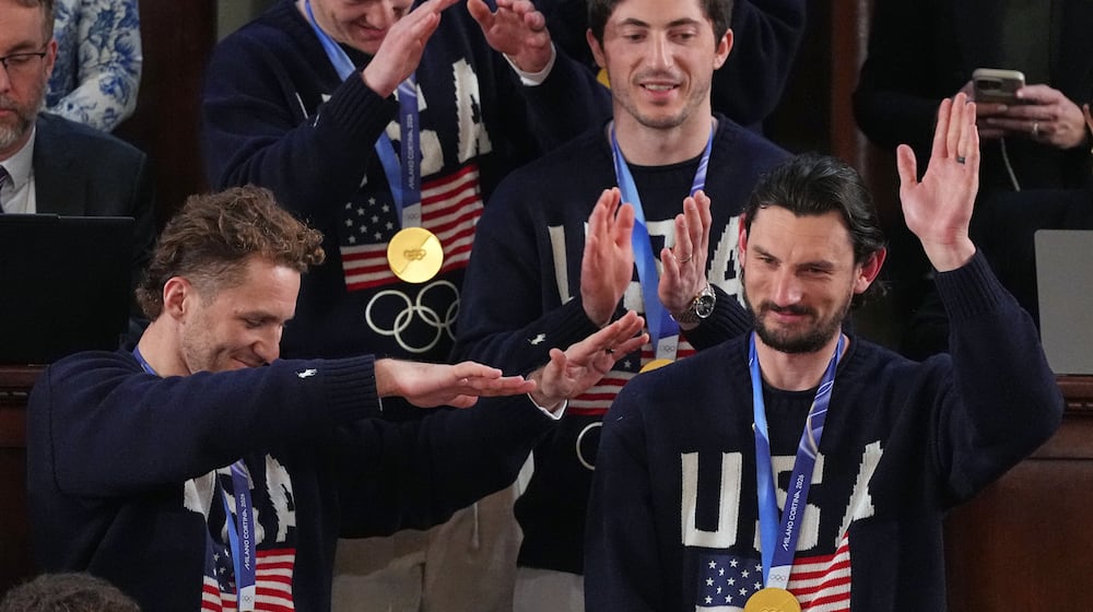 Members of the United States' hockey team attend as President Donald Trump delivers the State of the Union address to a joint session of Congress in the House chamber at the U.S. Capitol in Washington, Tuesday, Feb. 24, 2026. (AP Photo/Matt Rourke)
