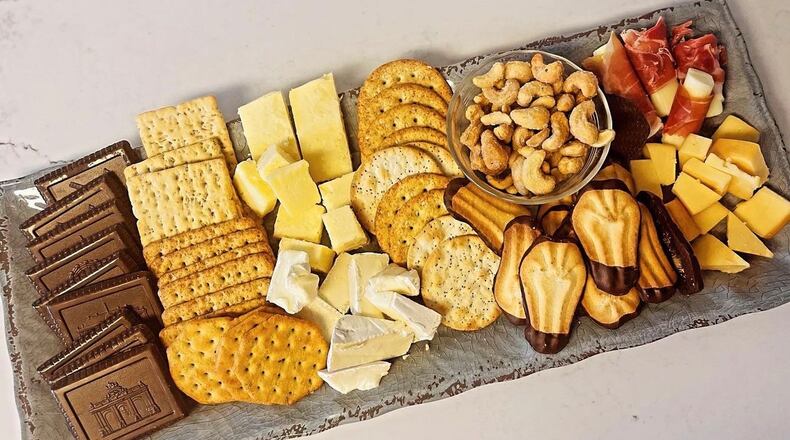 A cheese plate created completely with cheese, cookies, nuts and crackers from a local ALDI store. MANDY GAMBRELL/STAFF
