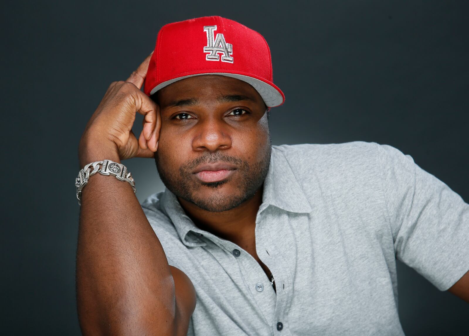 FILE - Actor and musician Malcolm-Jamal Warner poses for a portrait in Los Angeles, Oct. 8, 2015. (Photo by Danny Moloshok/Invision/AP, File)
