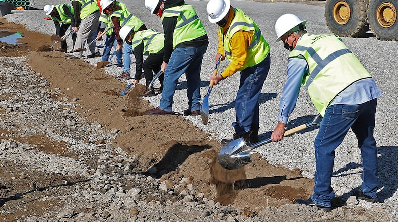 Officials break ground for the new Northeastern School Friday. BILL LACKEY/STAFF