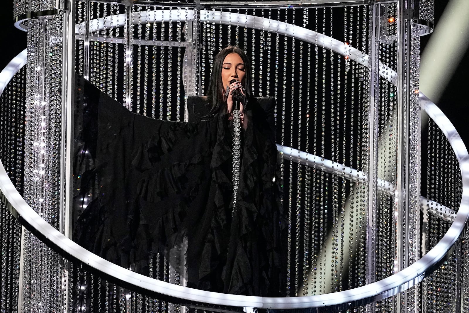 Yuval Raphael from Israel performs the song "New Day Will Rise" during the second semi-final of the 69th Eurovision Song Contest, in Basel, Switzerland, Thursday, May 15, 2025. (AP Photo/Martin Meissner)
