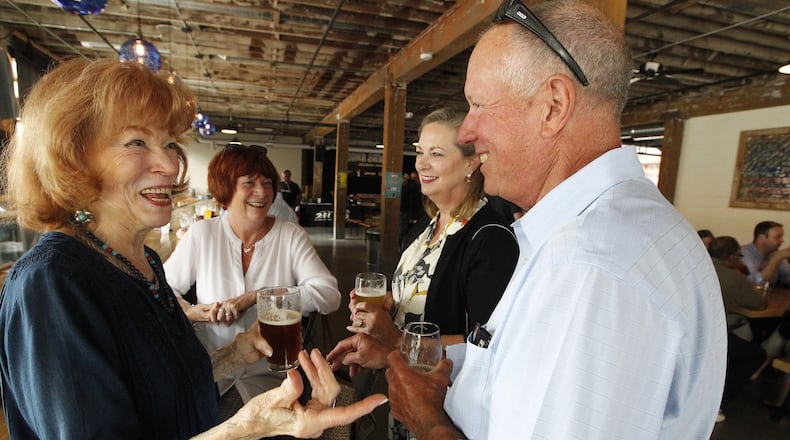 Enjoying themselves at Mother Stewart’s Brewing Co. are, from left, Rita Buturain, Kathy Michael, Kathy Limes and Mark Elliott. Bill Lackey/Staff