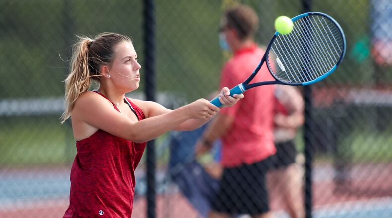 Northwestern sophomore Taylor Errett hits a ball during their match against Greeneview last season. CONTRIBUTED PHOTO BY MICHAEL COOPER