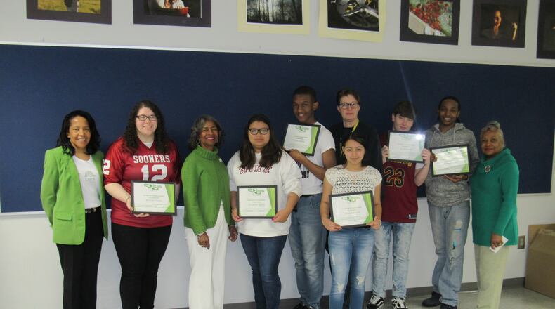 Members of the Springfield Chapter of the Links, Inc., involved students from Springfield High School’s Digital Media Program in the Links’ program “Preserving Our Legacy: Interviews with community greats in Springfield, Ohio.” Interviews with half a dozen prominent African-Americans were filmed and edited by students for showing June 16 at the Gammon House’s 12th annual Juneteeth Celebration. Pictured are members of the Links’ National Trends Facet, the students and their teacher. From left are Dorris Daniel, Kaitlyn Torres, Jean Harper, Elizabeth Juarez, Fred Almon, Jessica Santos-Villatoro (forward), teacher Sysan Tyner, Jacob Rogers, Mike Owens and Lula Cosby. Photo courtesy of The Links