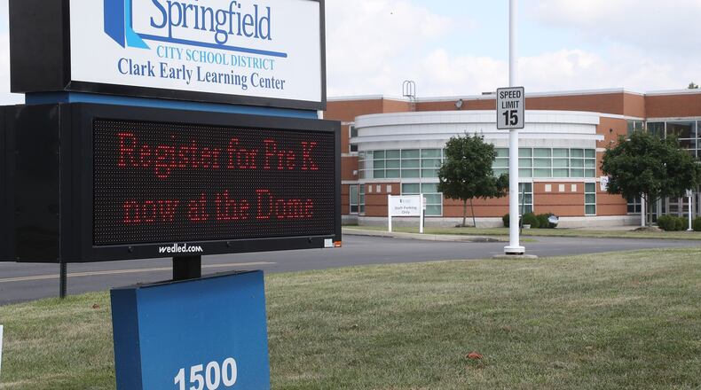 The Springfield City school board passed a resolution calling for the end of the distress commission. BILL LACKEY/STAFF