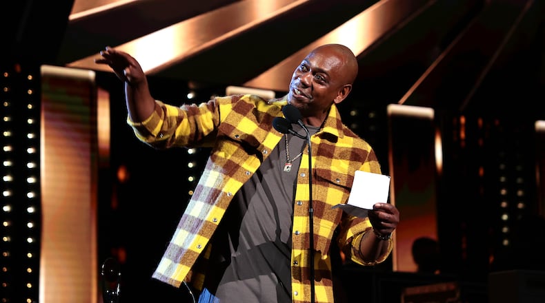 Dave Chappelle, who lives just outside of Yellow Springs, speaks onstage during the 36th Annual Rock & Roll Hall Of Fame Induction Ceremony at Rocket Mortgage Fieldhouse, on Oct. 30, 2021, in Cleveland. Dave Chappelle & Friends will take over the Hollywood Bowl April 28-30 and May 3 as part of Netflix is a Joke: The Festival. (Dimitrios Kambouris/Getty Images/TNS)
