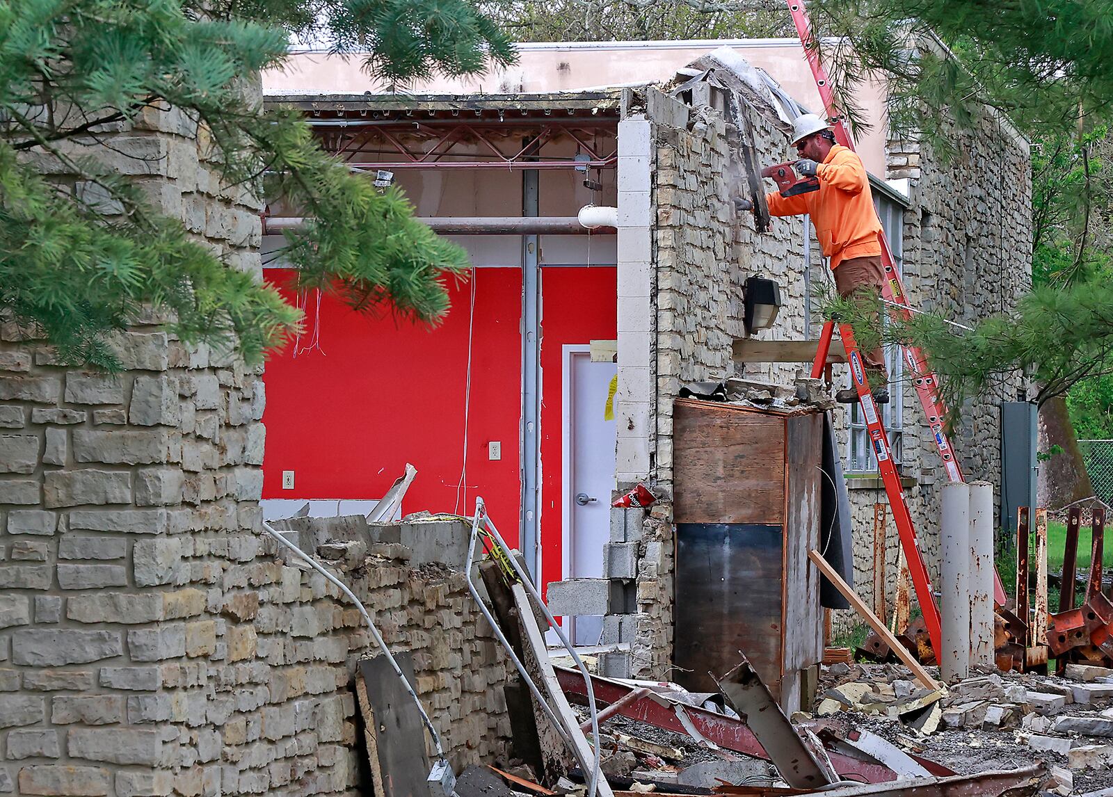 A crew from Marker construction started demolishing the front section of the Springfield Museum of Art's old north wing Friday, April 28, 2023. The demolition is part $7 million renovation project that projected to be complete by the end of the year. BILL LACKEY/STAFF