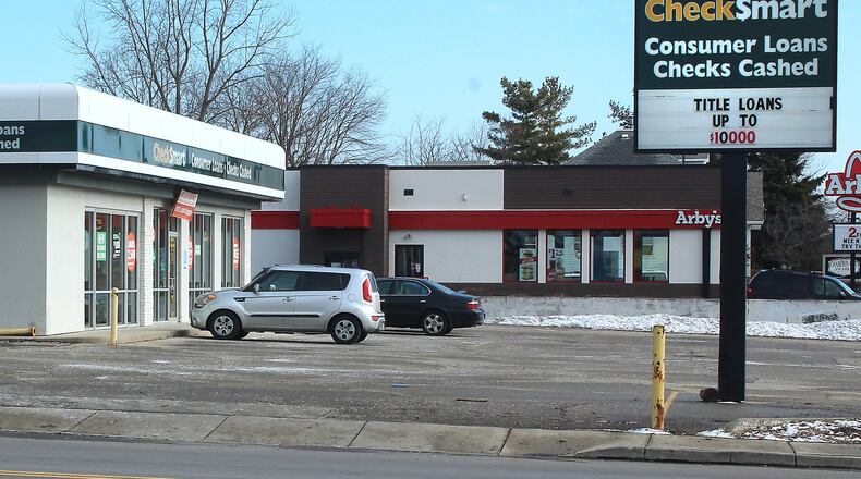 A consumer coalition hopes to collect enough petition signatures to get the Payday Loan Reform plan on the statewide ballot. JEFF GUERINI/STAFF