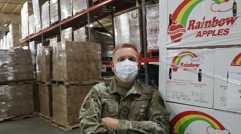 Sgt. Bryon Ingram, of Air National Guard, at the Second Harvest Food Bank where he's been working since the COVID pandemic started. BILL LACKEY/STAFF
