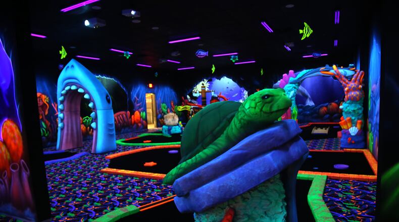 Scene75, closed since May 2019, plans to reopen later this month. The indoor entertainment center on Poe Avenue in Vandalia was heavily damaged by the Memorial Day tornadoes. The newly refurbished center has added a two-story carousel, a spin roller coaster, an indoor 18-hole mini golf course and a banquet center. LISA POWELL / STAFF