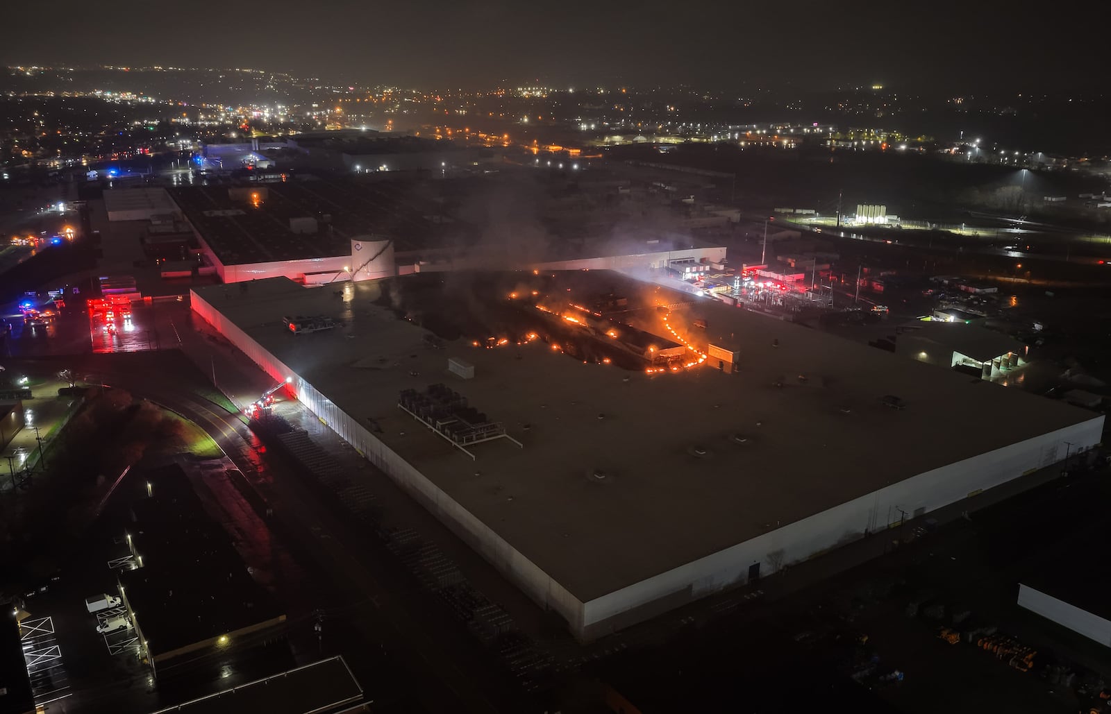 Giant flames coming from Fuyao Glass America plant in Moraine. NICK GRAHAM/STAFF