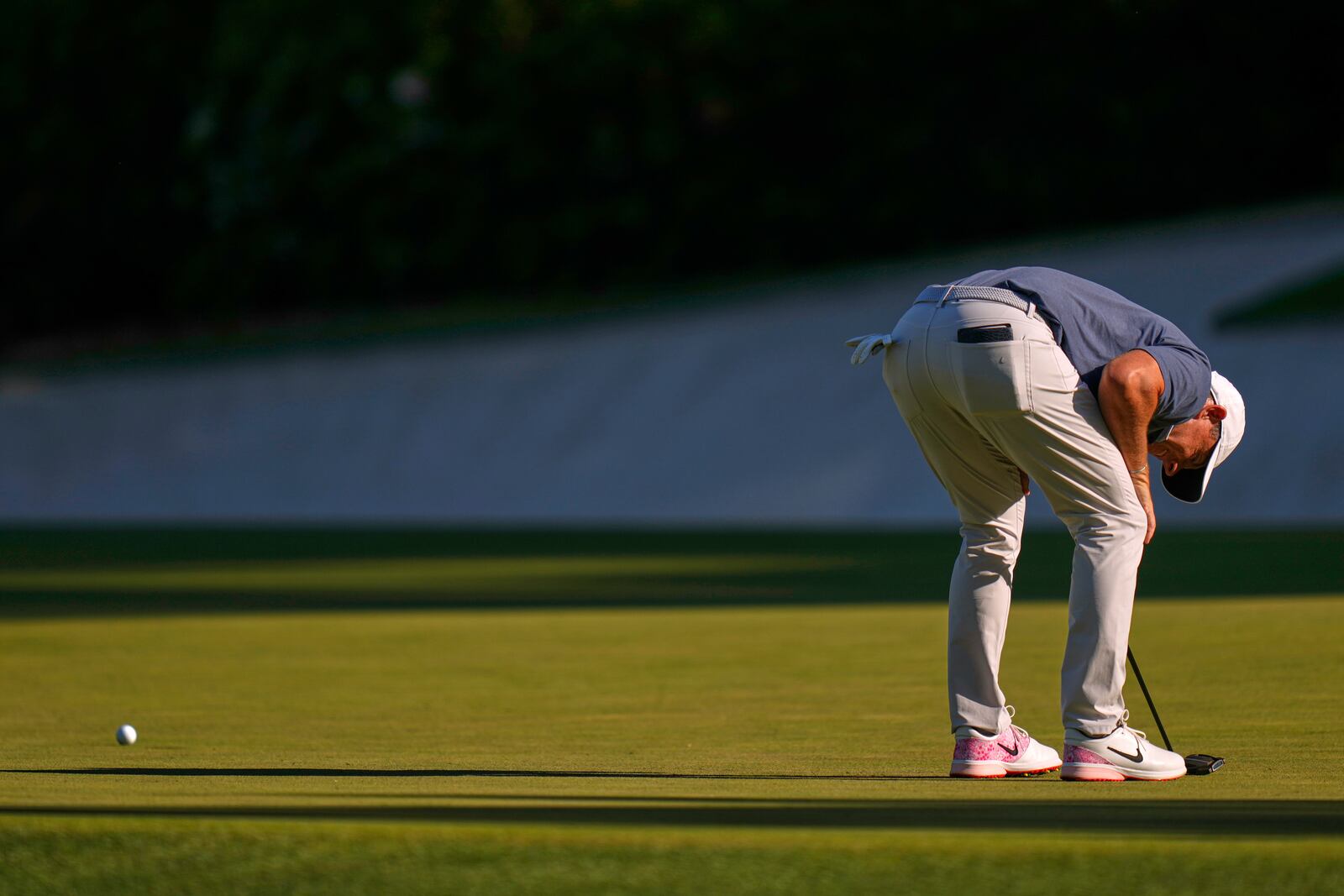 Rory McIlroy, of Northern Ireland, reacts after missing a putt on the 13th hole during the final round at the Masters golf tournament, Sunday, April 13, 2025, in Augusta, Ga. (AP Photo/Julia Demaree Nikhinson)