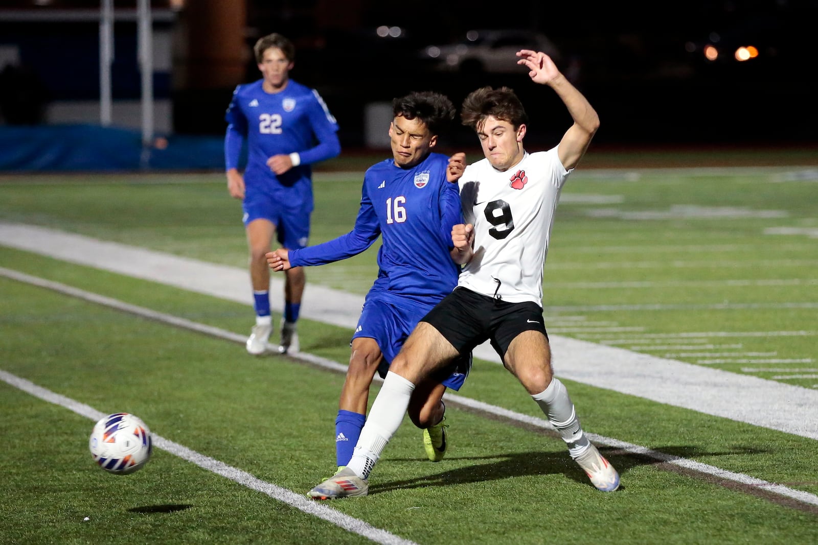Carroll High School junior Matteo Dessert battles with Franklin junior Talon Conard for possession of the ball during the Patriots 8-0 victory over the Wildcats in a Division III district semifinal game on Tuesday, Oct. 21 at Spoerl-Bartlett Field. STEVEN WRIGHT / STAFF