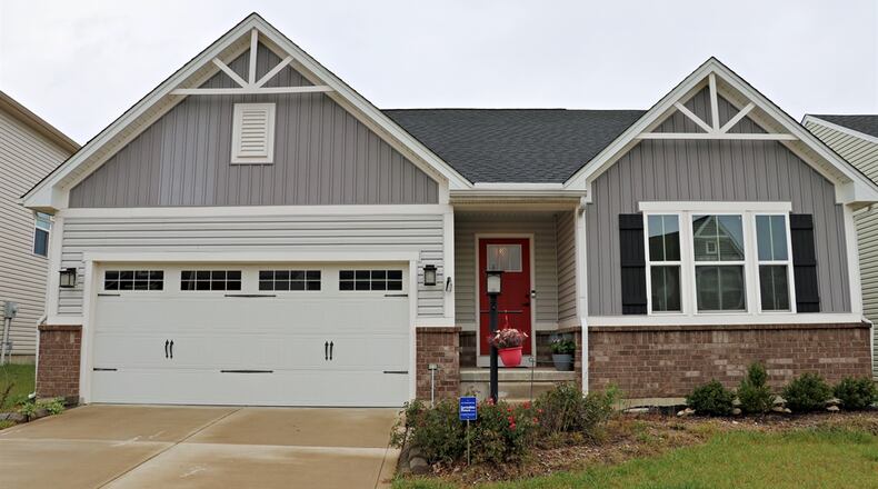 Listed for $374,975 by Tami Holmes Realty, the frame ranch at 5139 Red Buckeye Drive has about 2,688 square feet of living space including the finished basement with egress window. Located within The Greens at Carriage Hill in Bethel Twp., the property has a deep back yard surrounded by a white-vinyl picket fence. CONTRIBUTED