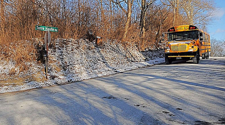 A trash truck rear-ended a Northwestern Local Schools bus Friday morning at the intersection of Snyder Domer, Terre Haute and Thackery roads. No one was reportedly injured. STAFF PHOTO / MARSHALL GORBY