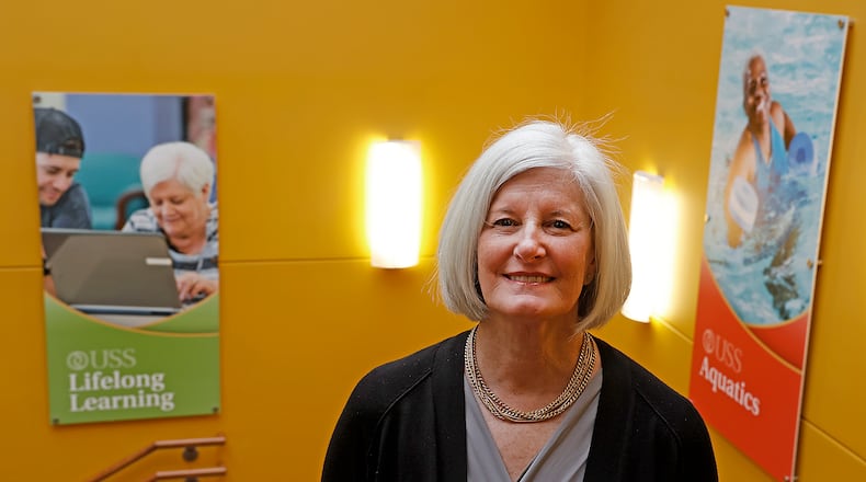 Monica Spencer, from United Senior Services in Springfield, says that scammers will try anything to get money from senior citizens. BILL LACKEY/STAFF