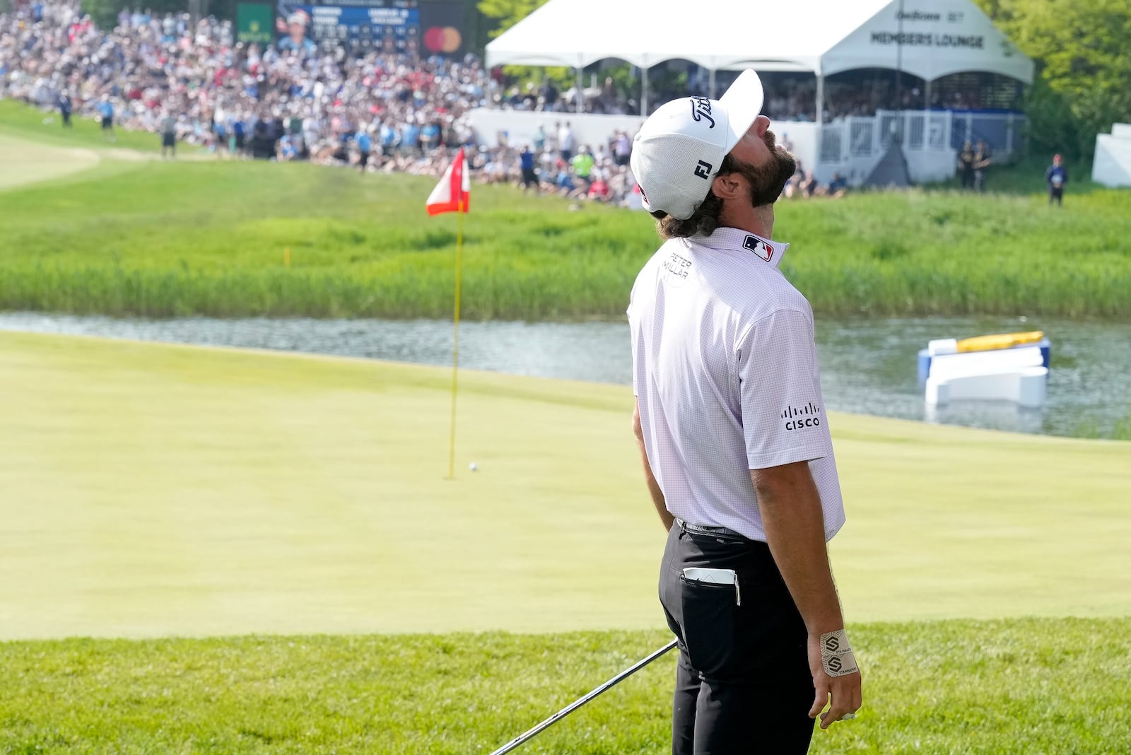 Cameron Young reacts after missing a chip on the 18th hole during the final round of the RBC Canadian Open golf tournament in Caledon, Ontario, Sunday, June 8, 2025. (Frank Gunn/The Canadian Press via AP) /The Canadian Press via AP)
