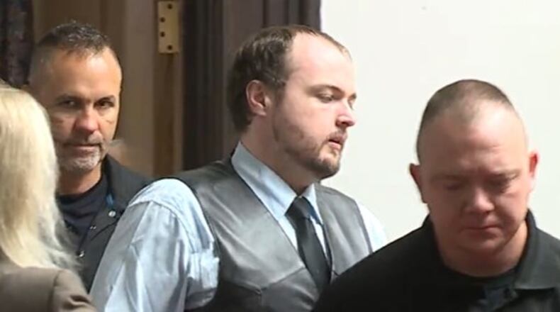 George Wagner IV, middle, is on trial for killing eight members of the Rhoden family in Pike County in April 2016. Here he is seen entering the Waverly courtroom Nov. 2, 2022, more than a month into his trial. WCPO/CONTRIBUTED