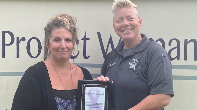 Laura Baxter, the executive director of Project Woman, stands next to Sgt. Denise Jones, who received the 2021 Chrysalis award. Photo provided by Project Woman.