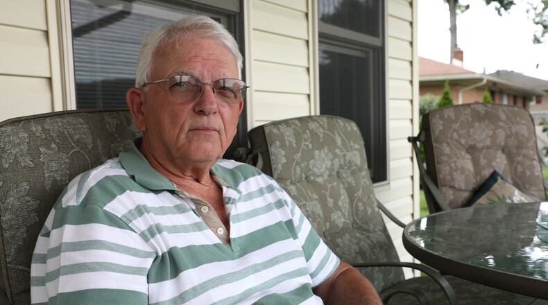 The Clark County Democratic Chairperson Charlie Bush at his Moorefield Twp. home Monday. Bill Lackey/Staff