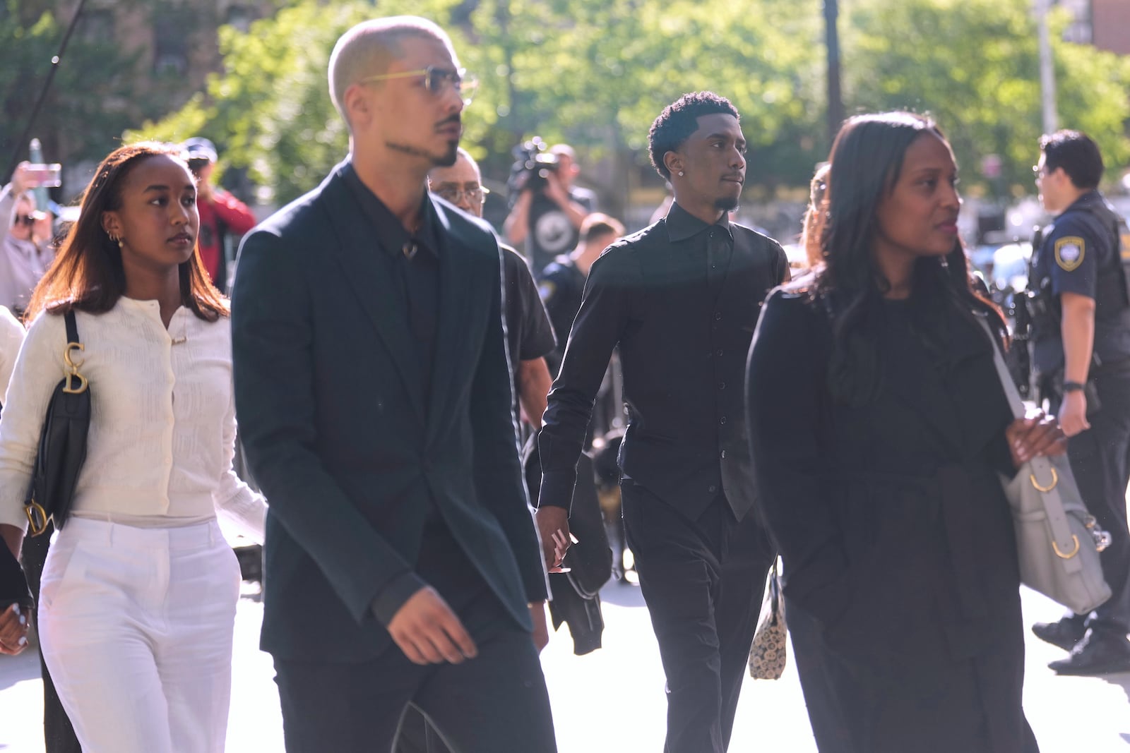 Family and supporters of Sean "Diddy" Combs, including King Combs, second from right, arrive to the courthouse in New York, Monday, May 12, 2025. (AP Photo/Seth Wenig)